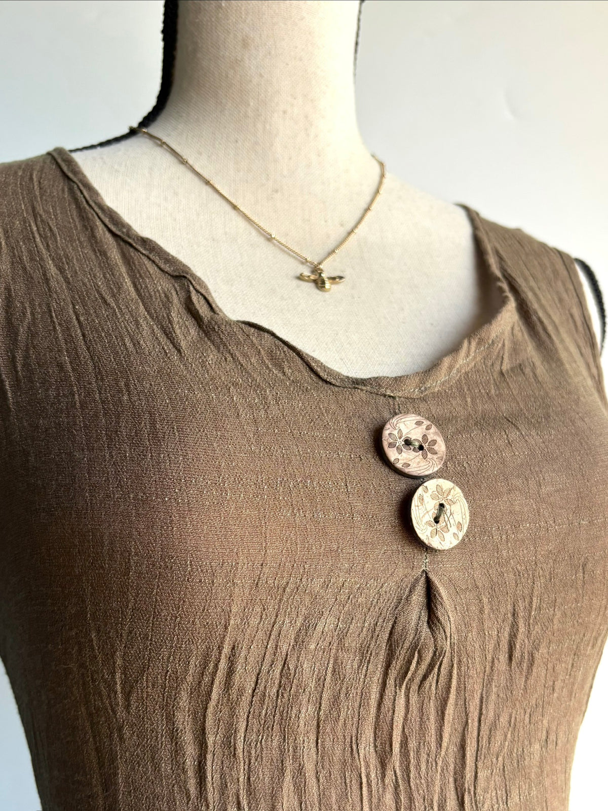 brown asymmetrical top