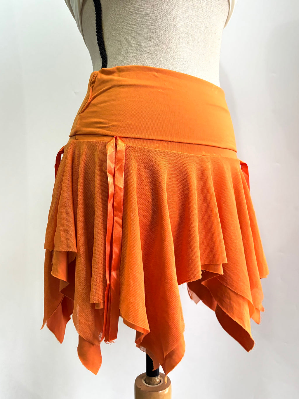 orange asymmetrical skirt