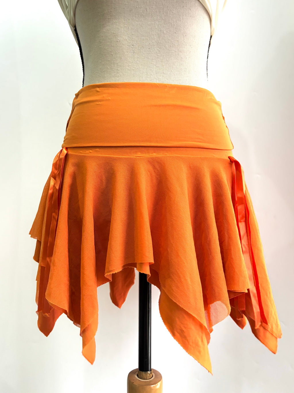 orange asymmetrical skirt